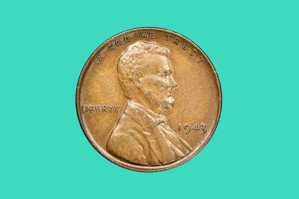 Close-up image of a rare 1943 copper Lincoln Wheat Penny on dark background