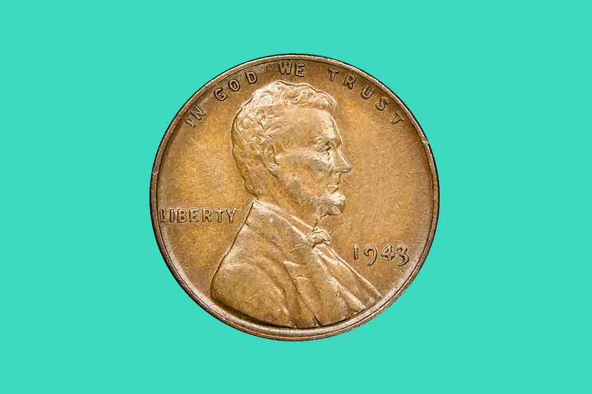Close-up image of a rare 1943 copper Lincoln Wheat Penny on dark background