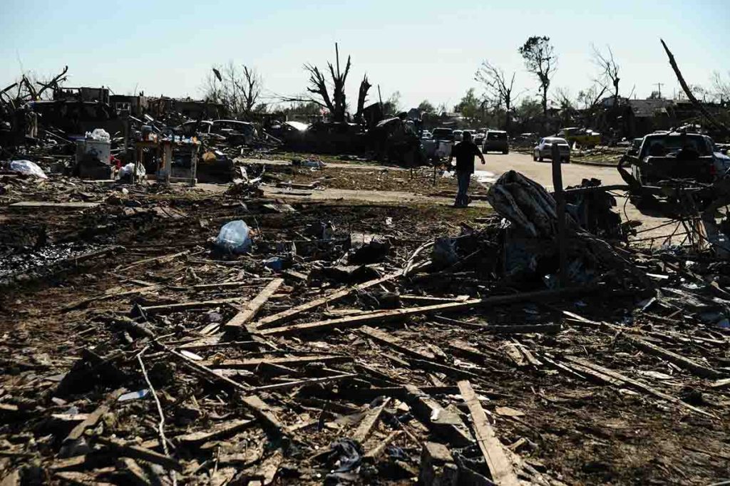 Emergency aid workers providing disaster relief supplies in a flood-affected US community