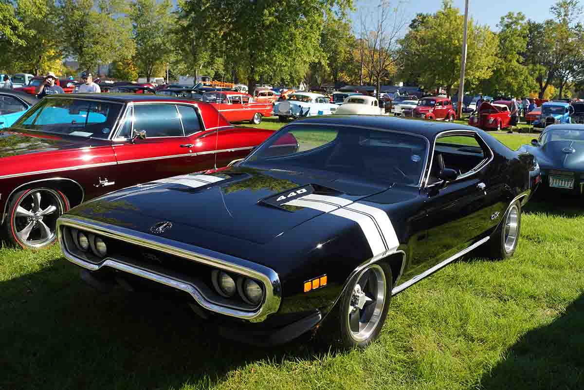 Classic Plymouth GTX muscle car with 426 HEMI parked.